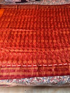 Vibrant Orange and Red Ikat Saree