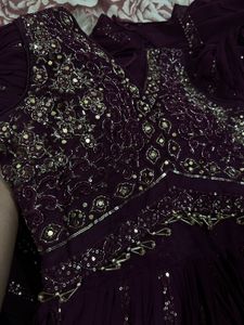 brand new Embellished gown with falling sleeves