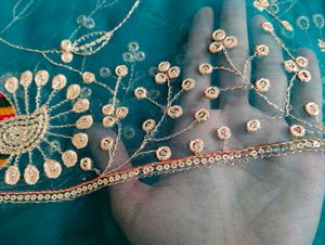 Exquisite Teal Peacock Embroidered Saree