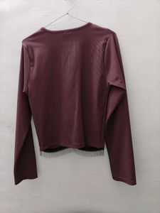Ribbed Long Sleeve Top with Fringed Hem