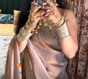Elegant Beige Saree with Embellished Border