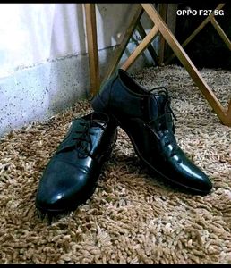 4. Classic Black Formal Shoes