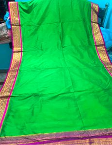 Vibrant Green Silk Saree with Pink Border