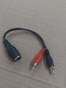 A 5-pin DIN male connector splitting into two