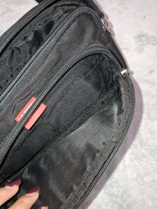 black sling bag with red strip🌸🌸