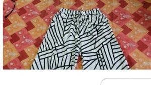 Flared white,black Geometric Print trousers