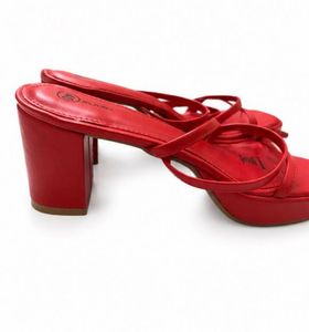 Unused red heels