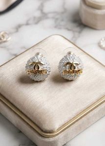 Chanel Paris Stud Earrings