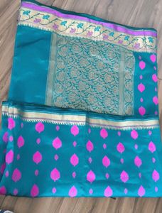 Elegant Teal Silk Saree with Pink Motifs