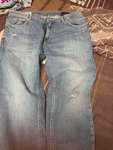 Light Wash Distressed Denim Jeans