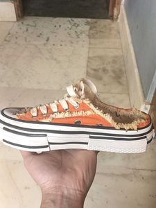 Distressed Orange Sneakers