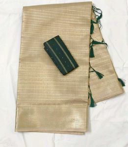 Elegant Beige Saree with Golden Stripes