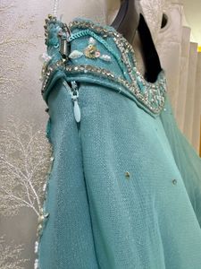 Stunning Teal Embellished Lehenga Choli