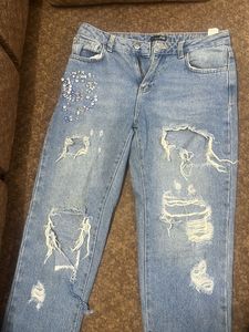 Ripped & Bejeweled Denim Jeans