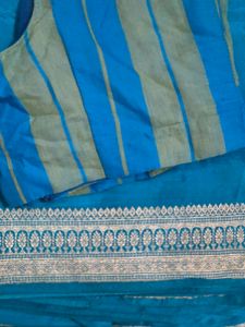 Vibrant Teal Saree with Striped Blouse