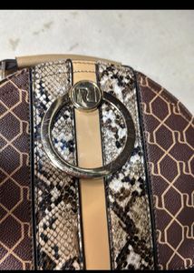 River Island Monogram Backpack