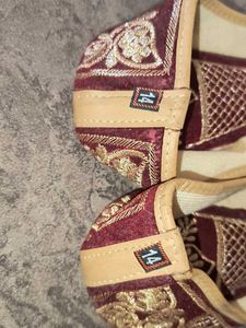 Maroon Juttis with Gold Embroidery