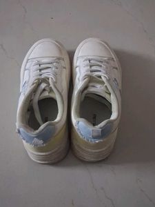 White Casual Sneakers with Blue Accents