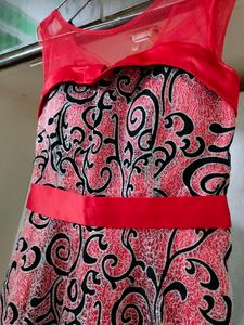 Glittery Red Gown With Black Detailing