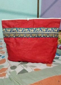 Elegant Red Pouch with Embellished Border