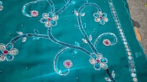 Stunning Teal Saree with Embellishments