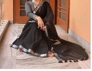 Mesmerizing Black With Silver Border And Tassels.
