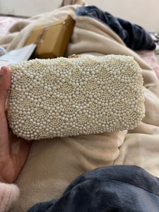 white pearl clutch