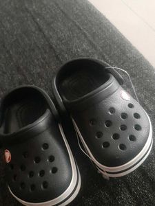 New black unisex bayaband Crocs for babies