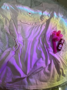 A cute pink baby doll top