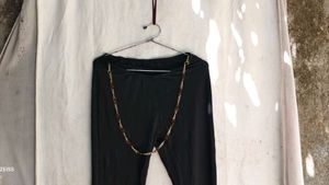 Black Flared Pants with Chain Detail
