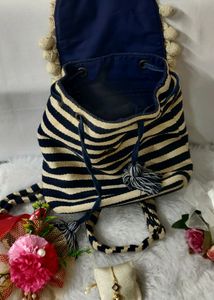 🎀A STYLISH STRIPPED BACKPACKWITH POM-2 DETAILING