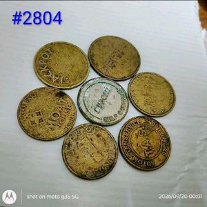 set of 7 used vintage Collectible tokens