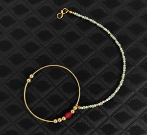 Elegant Gold Nose Ring with Beads