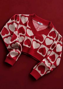 RED & IVORY HEART PRINT CROPPED V-NECK SWEATER