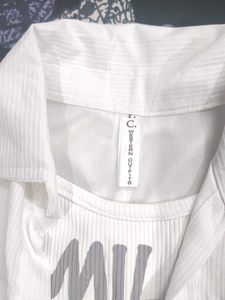 Chic White Jacket with Graphic Tee