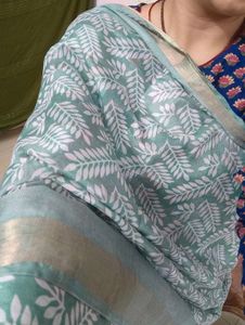 Elegant Green Saree with White Leaf Print