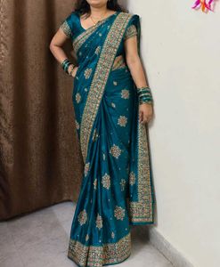 Elegant Teal Embroidered Silk Saree