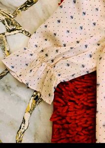 50. Chic Printed Blouse with Ruffles