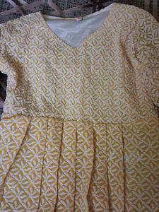 Elegant Yellow Kurta with Intricate Pattern