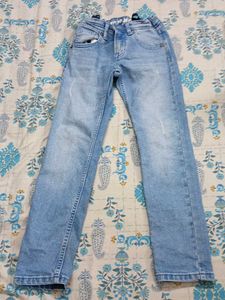 Light Wash Distressed Denim Jeans