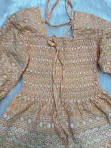 Peach Embroidered Smocked top