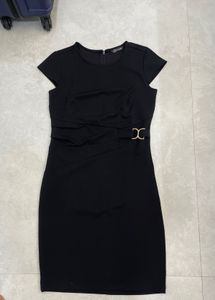 Chic Black Dress with Gold Accent