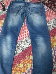 Distressed Blue Jeans
