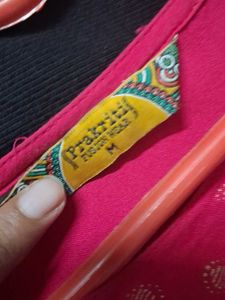 a pink short kurti
