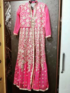 A Beautiful Pinkish Gown With Golden Work