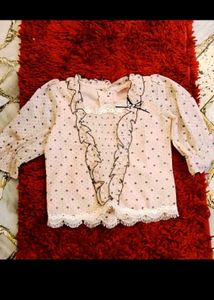 50. Chic Printed Blouse with Ruffles