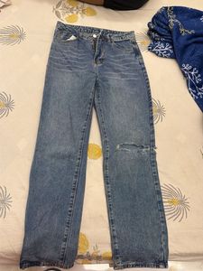 Distressed Blue Denim Jeans