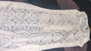 A Net Jacket With Button Closure
