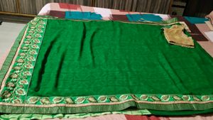 fix rate Beautiful Green Embroidered Saree