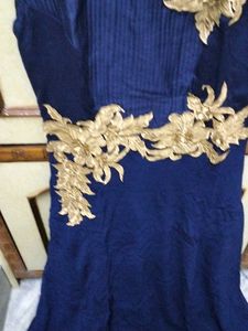 Elegant Navy Blue Dress with Gold Embellishments